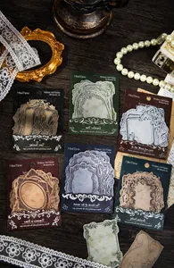 Macro shot of 75x75mm Baroque retro paper notes with elegant vintage frame designs