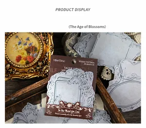 Macro view of vintage European style decorative paper labels with intricate borders