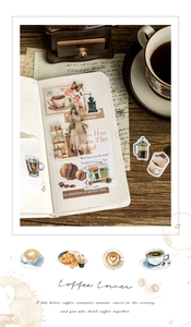 Detail view of vintage coffee-themed aesthetic stickers applied on a journal page