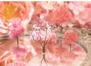Detail of pink cherry tree PET stickers with mirror reflections and floral backdrop