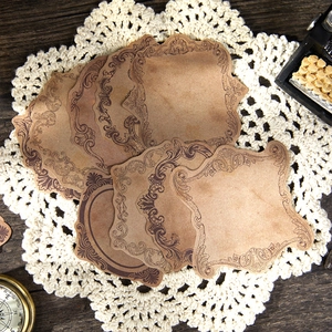 Vintage scrapbooking paper set with antique floral frames on lace and wooden background