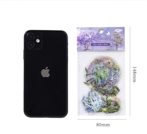 Size comparison of purple forest PET sticker pack with a smartphone reference