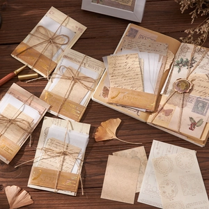 Vintage scrapbookingpakket met 32 vellen verouderd papier en stickers voor dagboekdecor