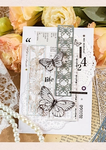 Detailed macro view of vintage butterfly lace paper and retro material stickers for DIY journals