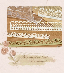 Detailed view of vintage lace paper strips with hollow cutouts for DIY scrapbooking decor