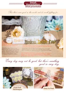 Macro detail of gold foil gothic lettering stickers for scrapbooking and gift decor