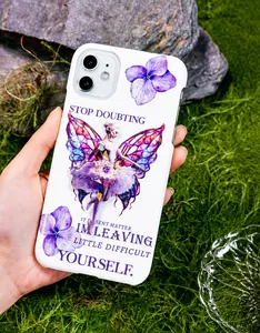 Close-up of white phone case with purple floral and butterfly wing fairy prints