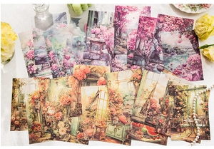 Flachbild von Vintage-Scrapbook-Papier mit Blumenmotiven und europäischen Gutshof-Szenen