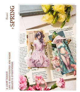 Details von handgezeichneten Vintage-Sticker-Sets auf offenem Magazin mit Frühlingsblumen