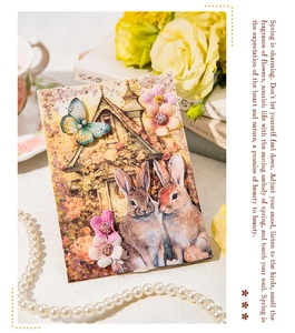 Detail der Scrapbooking-Karte mit 3D-Schmetterling, Blumen und Vintage-Hasenmotiven