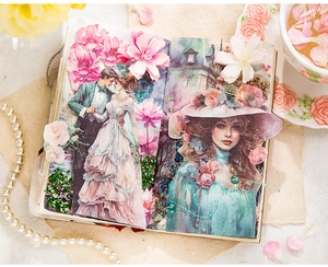 Künstlerisches Layout mit Blumen und Vintage-Aufklebern auf einer dekorativen Buchseite