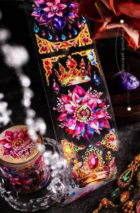 Macro detail of Radiant Flowers PET tape with shell light process and crown jewels