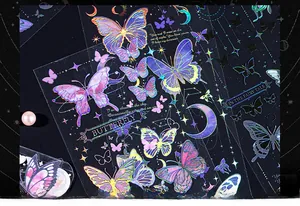 Macro shot of colorful laser-engraved PET butterfly stickers with golden metallic shine