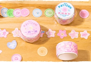 Close-up of assorted colorful washi tape rolls and stickers on a wooden surface