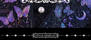 Detail of holographic purple butterfly stickers with shimmering laser effect on black background