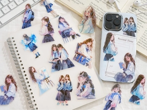 Close-up of PET stickers with aesthetic girl illustrations on notebook and phone case