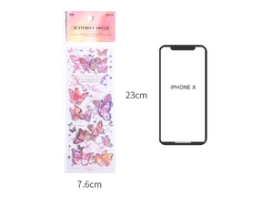 Size comparison showing two sheets of 23cm x 7.6cm holographic butterfly stickers next to a phone