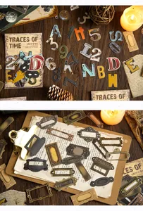 Detail of vintage Traces of Time stickers featuring rusted metal-style labels and numbers