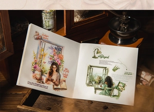 Detail of vintage watercolor stickers with coffee and reading theme on a journal