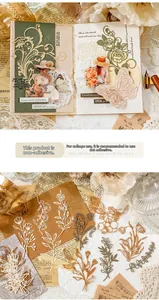 Detailansicht lasergeschnittener floraler Papierspitze und Vintage-Botanik für Journale