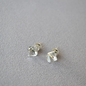 Minimalist square crystal silver stud earrings with multi-faceted geometric cut