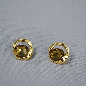 Elegant 925 silver irregular gold earrings with oval champagne gemstone and pleated metal