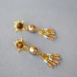 Orecchini vintage a forma di sole con occhio di tigre, perle e nappe di perline