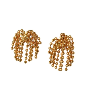Golden beaded chain tassel earrings with floral accents and a polished metallic finish