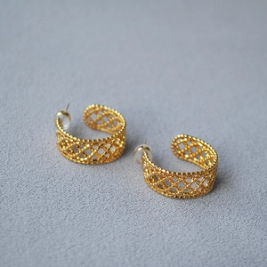 Elegant gold-plated brass C-shaped hoop earrings with intricate lace mesh pattern