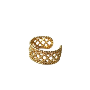 Exquisite gold open ring with intricate hollow lace mesh texture and adjustable band