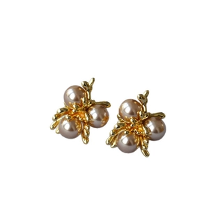 French vintage gold earrings with champagne pearls in a fireworks cluster design
