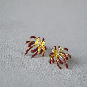 Vintage red enamel and gold-plated fireworks stud earrings with cubic zirconia