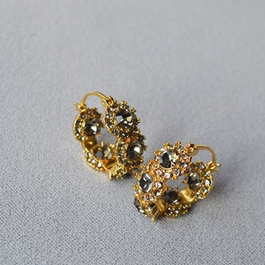 Retro brass gilded hoop earrings with grey glass crystals and pavé diamonds in flower design