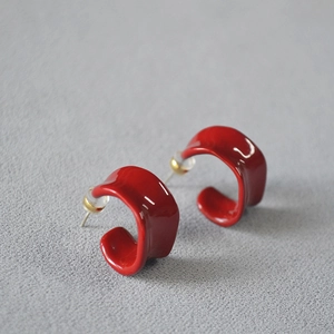 Artistic Angola red enamel irregular twisted C-shape earrings in a vintage style