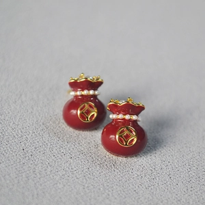 Miniature red glaze money bag stud earrings with brass gold plating and pearls