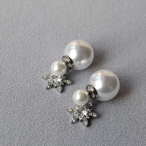 Elegant silver snowflake tassel earrings with dual pearl design and sparkling crystals
