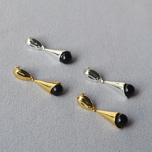 Minimalist long black onyx teardrop earrings in polished gold and silver finish