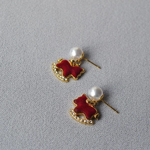 Elegant festive red flocked horse earrings with white pearl and sparkling crystals