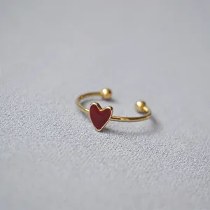 Adjustable gold plated brass open ring with a delicate red heart enamel charm detail