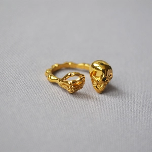 Gothic punk 18K gold-plated open ring featuring skull and skeleton claw design