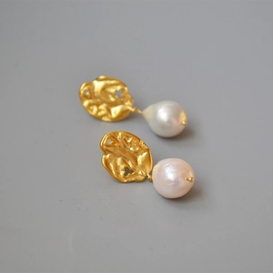 Vintage gold hollow leaf earrings featuring natural baroque pearl drops on 925 silver needles