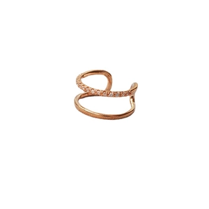 Minimalist double-layer rose gold ring with sparkling cubic zirconia on a white background