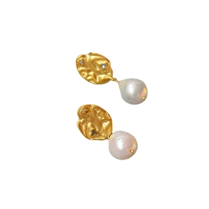 Vintage gold leaf drop earrings with baroque pearls and 925 silver pins on white base