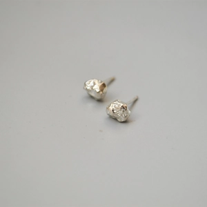 Minimalist silver irregular lava texture stud earrings for women with a 925 silver pin