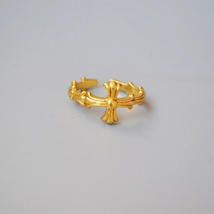 Retro golden cross open ring with vintage roman style and ornate engraved textures
