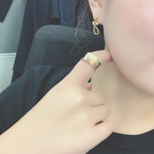 Minimalist twisted knot stud earrings and hammered wide band ring in 18K gold finish