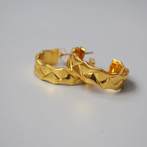Modern 18K gold plated C-shape hoop earrings with geometric quilted texture finish
