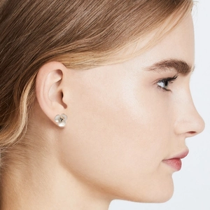 Elegant silver three-petal flower stud earrings with shell inlay and center dark crystal