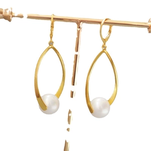 Minimalist gold brass earrings with teardrop metal frame and round white pearls