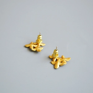 Vintage matte gold floral stud earrings with textured petals and 925 silver needle
